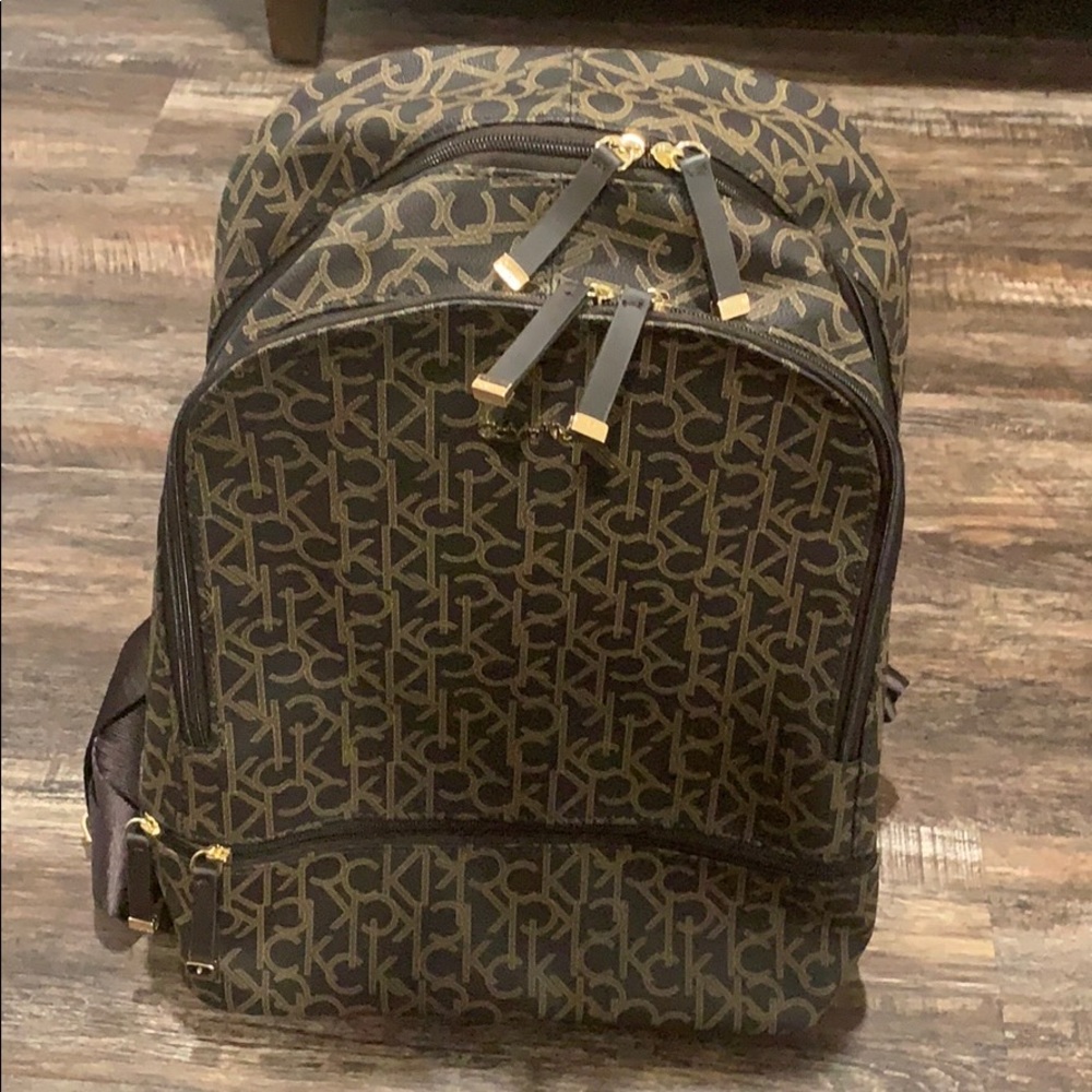 Calvin Klein Monogram Leather Backpack (NWT)